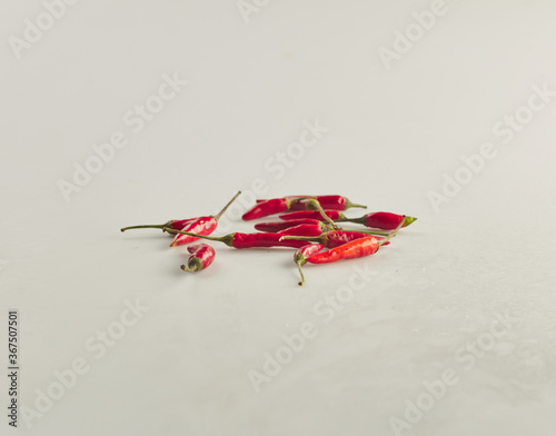 Red chili pepper on white background