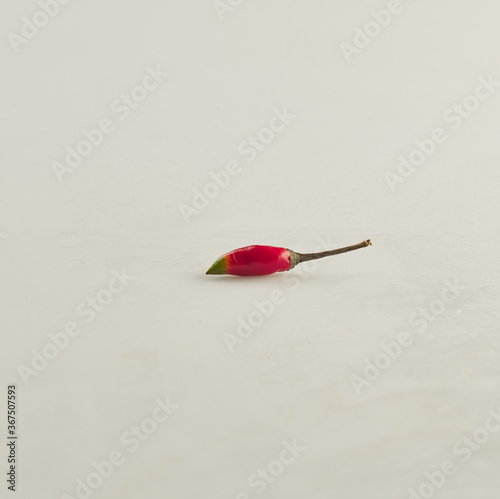 Red chili pepper on white background