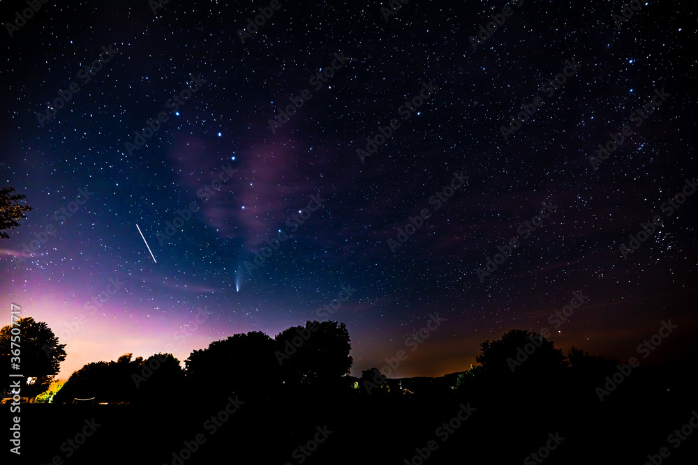 beautiful starry night with the neowise comet in the bavarian forest and the big dipper beautiful starry night with the neowise comet in the bavarian forest and the big dipper