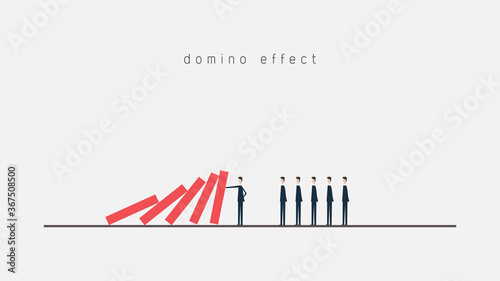businessman stopping the domino effect