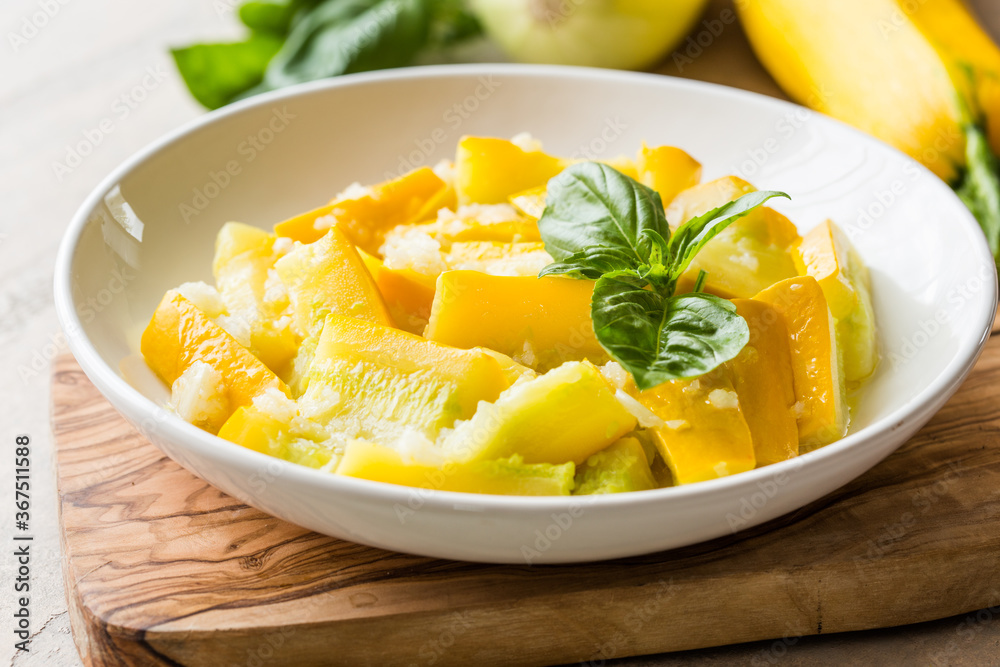 Healthy Organic Boiled  zucchini with garlic and basil. Ready to Serve. Italian food