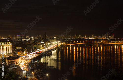 Beautiful View of the Dnieper river, Naberezhno-Kreschatitska street in Kiev, Ukraine. Night panorama of Kyiv