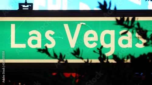 Fabulos Las Vegas, traffic sign glowing on The Strip in sin city of USA. Iconic signboard on the road to Fremont street in Nevada. Illuminated symbol of casino money playing and bets in gaming area.