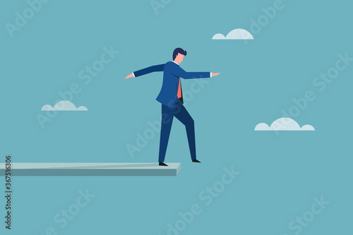Businessman standing on the end of the path. Concept for risk and challenge