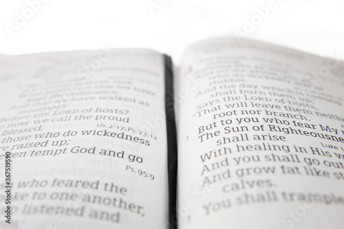 Φωτογραφία Open holy bible highlighted in Malachi 4: 2