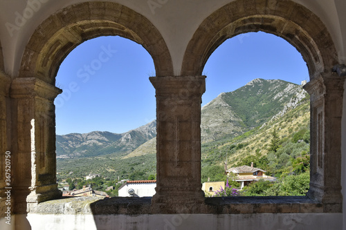 Masonry arches on a panoramic terrace overlooking the old town of Venafro, Italy.