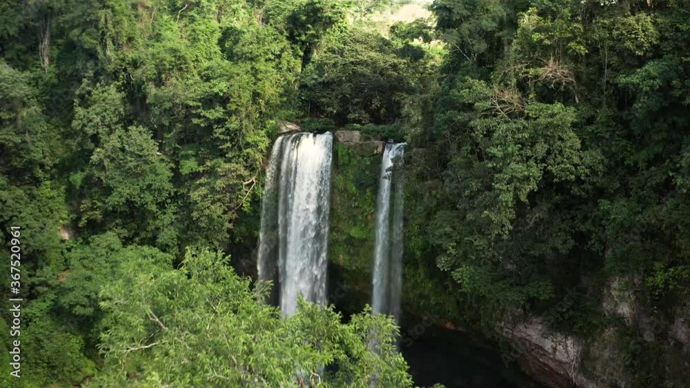 Aerial pull back over the Misol-Ha waterfall in Mexico Aerial pull back over the Misol-Ha waterfall in Mexico