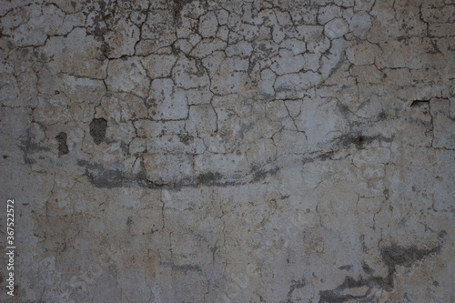 Old collapsed wall with plaster