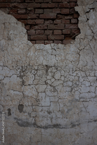Old collapsed wall with plaster