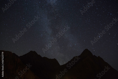 Milky Way over mountain range in Lofoten, Norway © koshi.one
