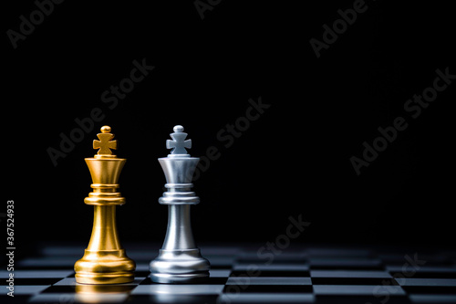 Canvas Print Two Stand of golden king chess and silver king chess