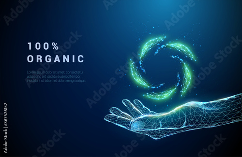 Abstract giving hand with falling green leafs.
