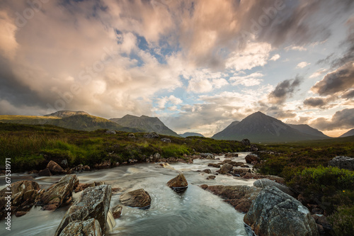 the river coupall as it flows towards the valley of glencoe in the argyll region of the highlands of scotland in summer