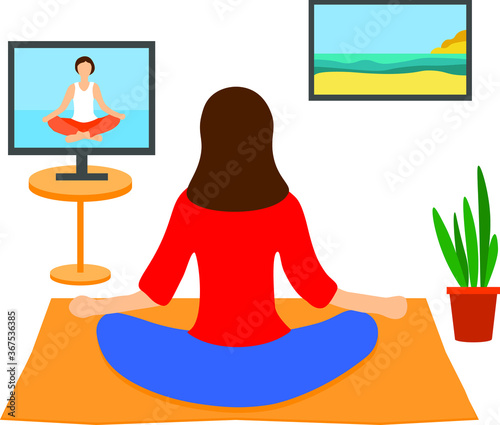 Girl doing yoga online at home