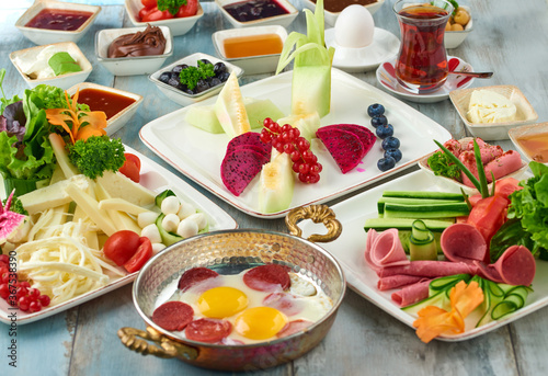 Delicious traditional turkish breakfast on wooden table