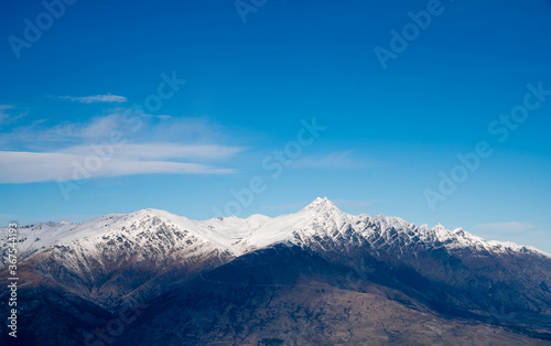 Winter landscape of snow mountain against blue sky in South island, New Zealand. © tonklafoto