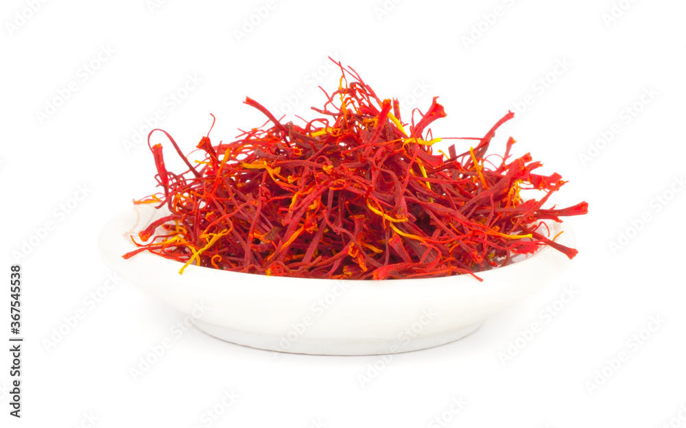 Fototapeta premium Dry Saffron Spice on a Plate Isolated on White Background.