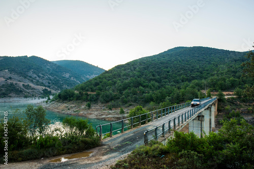 4x4 car crossing dangerous bridge in Aragon, Pyrenees, Spain