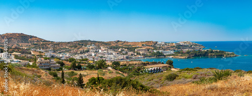 Agia Pelagia is a small town with a beautiful beach at Bay Aghia Pelaghia near Heraklion, Crete, Greece. Panoramic view HD Agia Pelagia. Travel and holidays places.