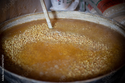 Casuela con maíz blanco para tortillas, tradicion mexicana de tortilleria en mexico photo