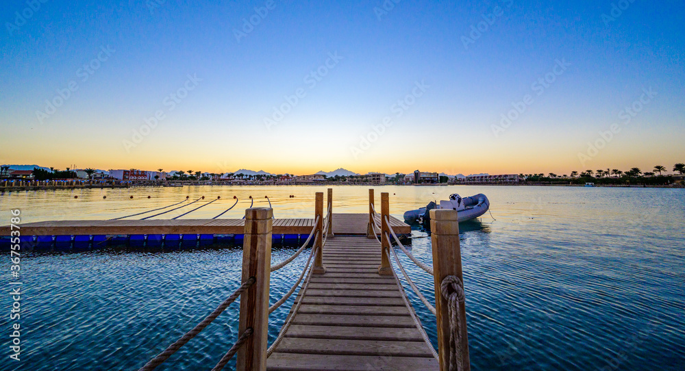 Fototapeta premium Wooden Pier on Red Sea in Hurghada at sunset, Egypt - travel destination in Africa