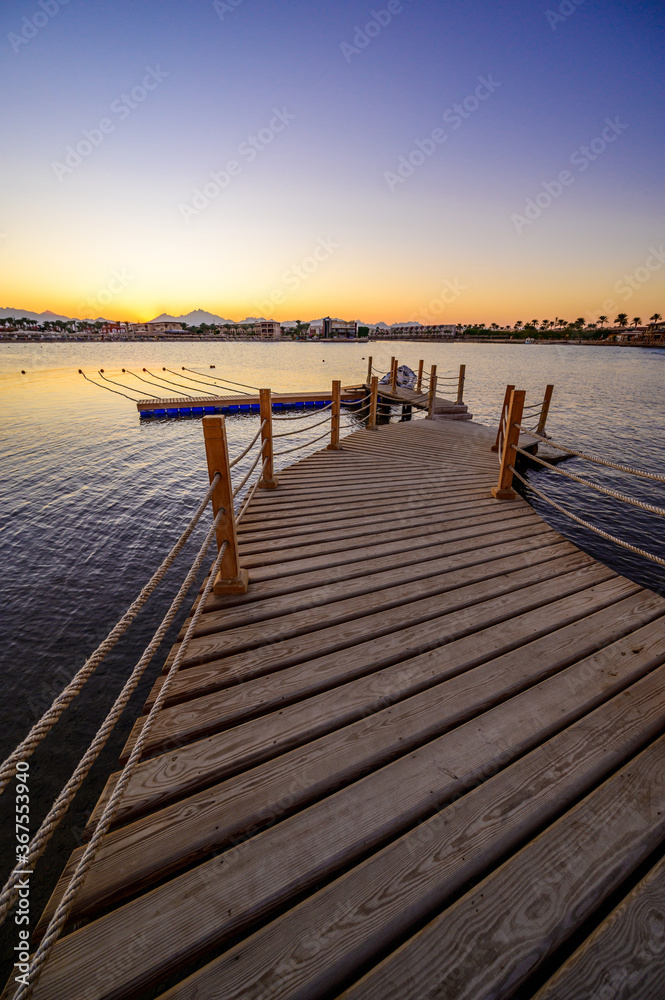 Wooden Pier on Red Sea in Hurghada at sunset, Egypt - travel destination in Africa