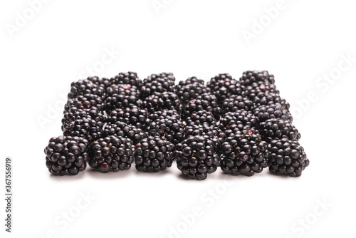 Tasty blackberry in a row isolated on white