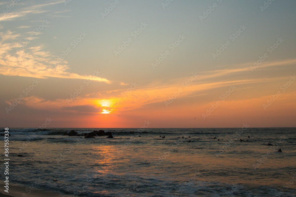 Fototapeta premium Beautiful shot of a pink sunset over the sea