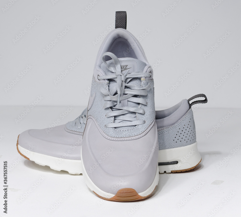 london, uk 05/08/2018 Nike Air Max thea Cool Grey Sail Metallic Pewter  running trainers. Nike air contemporary sneaker trainers. Nike sport and  street wear fashionable athletic apparel. Stock Photo | Adobe Stock
