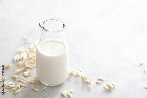 Oat milk. Delicious and healthy vegetarian alternative milk drink. Non-dairy milk