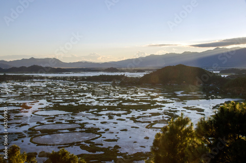 sunset in the mountains and aerial view of loktak lake
