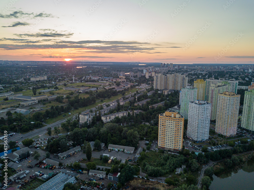 Sunset over the Dnieper River in Kiev. Aerial drone view.