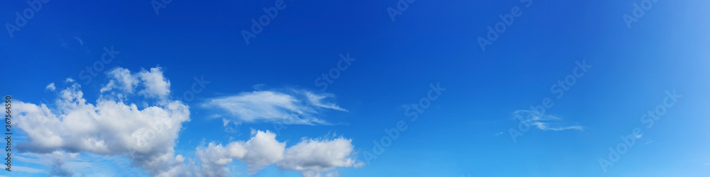 Panorama sky with beautiful cloud on a sunny day. Panoramic high resolution image. Panorama sky with beautiful cloud on a sunny day. Panoramic high resolution image.