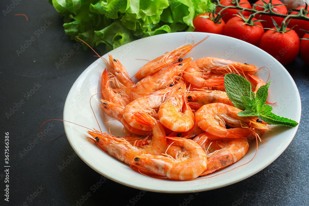 shrimp cooked seafood ready to eat prawn serving size. food background top view copy space healthy eating raw pescetarian shrimp cooked seafood ready to eat prawn serving size. food background top view copy space healthy eating raw pescetarian