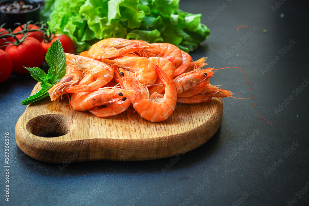 shrimp cooked seafood ready to eat prawn serving size. food background top view copy space healthy eating raw pescetarian shrimp cooked seafood ready to eat prawn serving size. food background top view copy space healthy eating raw pescetarian