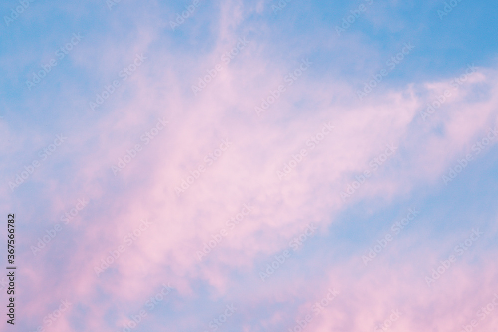 pastel blue and pink fluffy clouds background