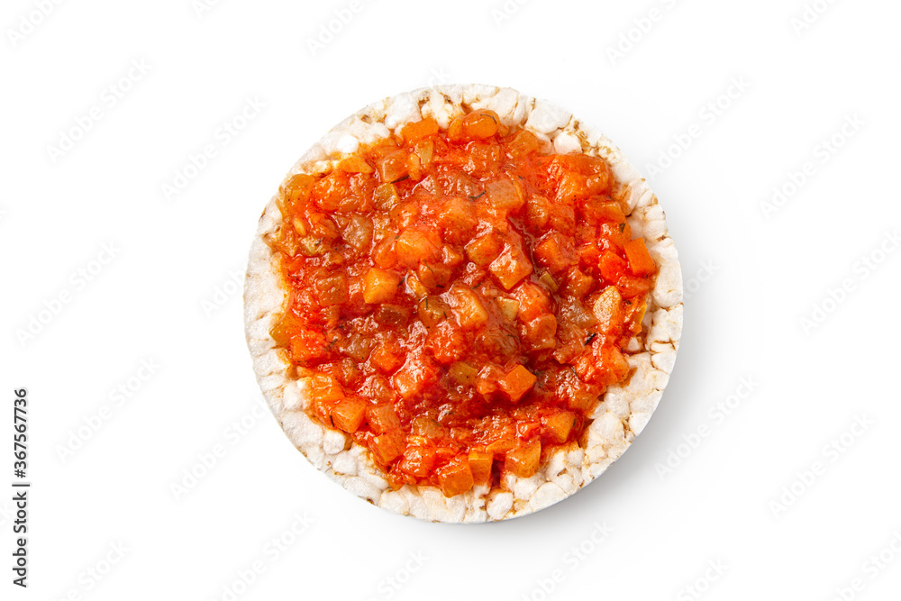 Rice cakes with vegetables toppings isolated on a white background Rice cakes with vegetables toppings isolated on a white background