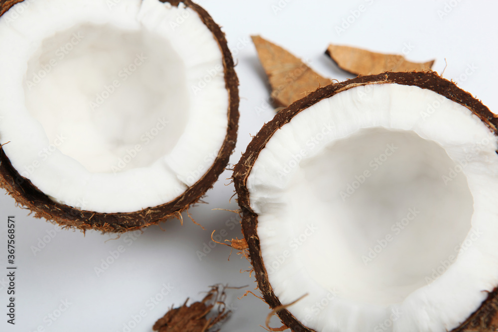 broken coconut on a white background.
broken coconut on a white background.
