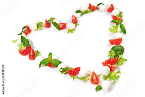 Tomato Mozzarella Heart Shape with Basil isolated on white Background