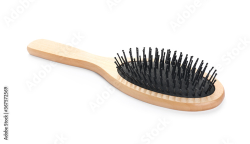 New wooden hair brush isolated on white