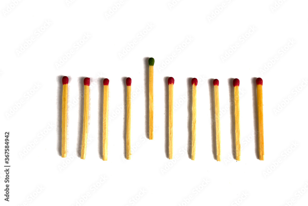 Matches folded in a row, one stands out Matches folded in a row, one stands out