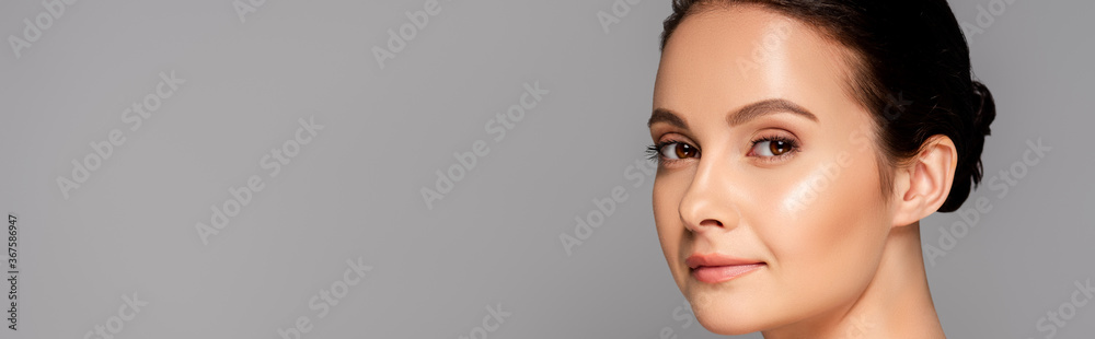 portrait of beautiful woman with perfect skin isolated on grey, panoramic shot portrait of beautiful woman with perfect skin isolated on grey, panoramic shot