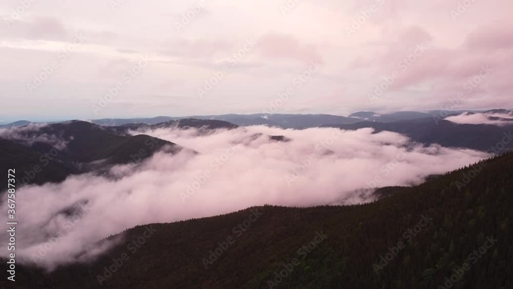 Aerial view of sunset over foggy mountains Aerial view of sunset over foggy mountains