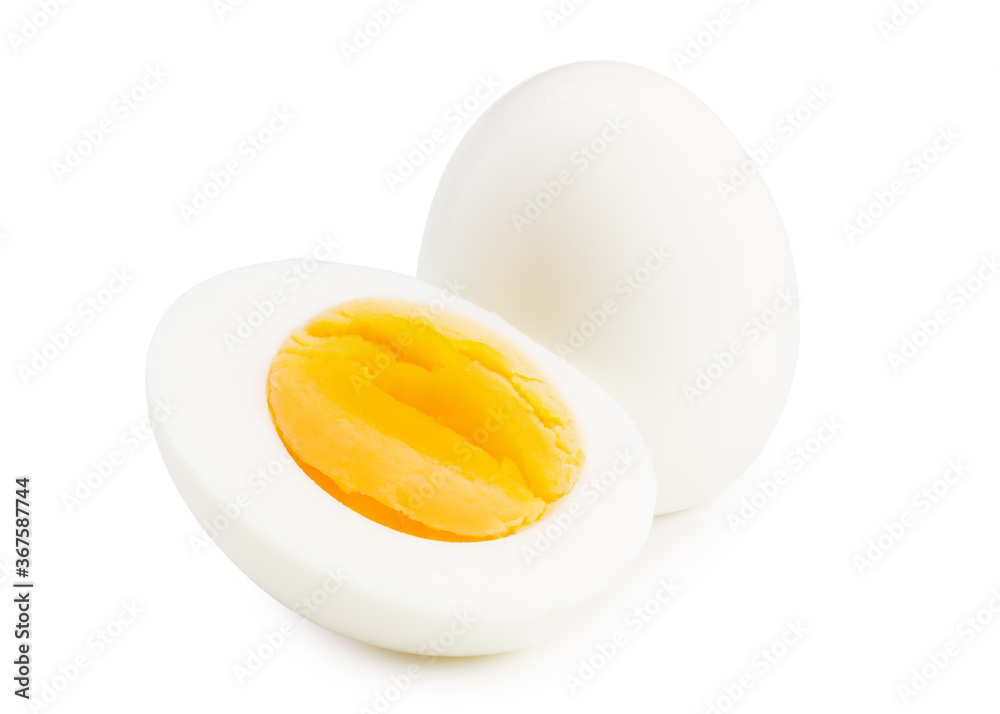 Single whole boiled egg with halved egg isolated on a white background Single whole boiled egg with halved egg isolated on a white background
