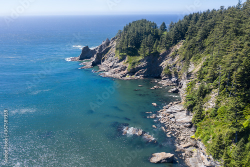 The cold Pacific Ocean meets the rugged coastline of Oregon just north of the town of Manzanita. Everyone in Oregon has free coastal access due to the Oregon Beach Bill of 1967.