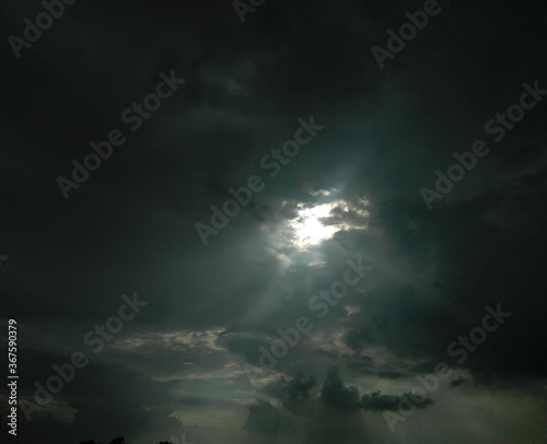 storm clouds over the moon