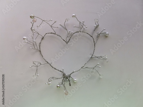 silver heart on a white background