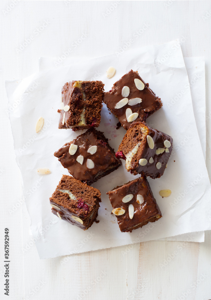 Bars of homemade chocolate, cheese and cherries cake Bars of homemade chocolate, cheese and cherries cake