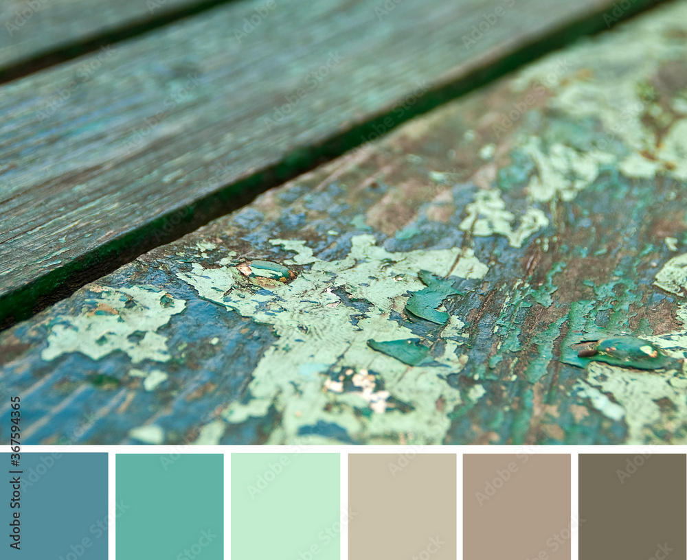 Green colored texture of the hulled rough boards of wooden bench, shallow depth of focus. Color palette swatches, combination of brown, beige and turquoise colors, inspired by nature.