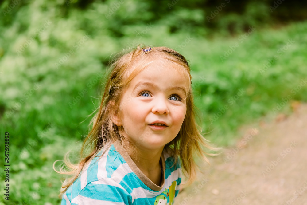 Toddler girl portrait in forest Toddler girl portrait in forest